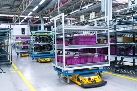 STR autonomously navigating a factory floor with payload